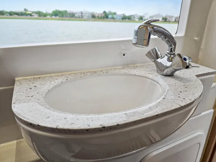 Calypso Yacht Photos Pics Modern sink with chrome faucet on Aquila 36 Sport yacht, 2020 model.