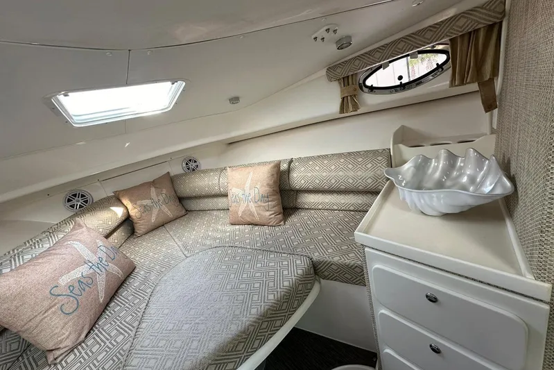  Yacht Photos Pics 2020 Stamas 326 Aegean cabin interior with cozy seating and decorative pillows.