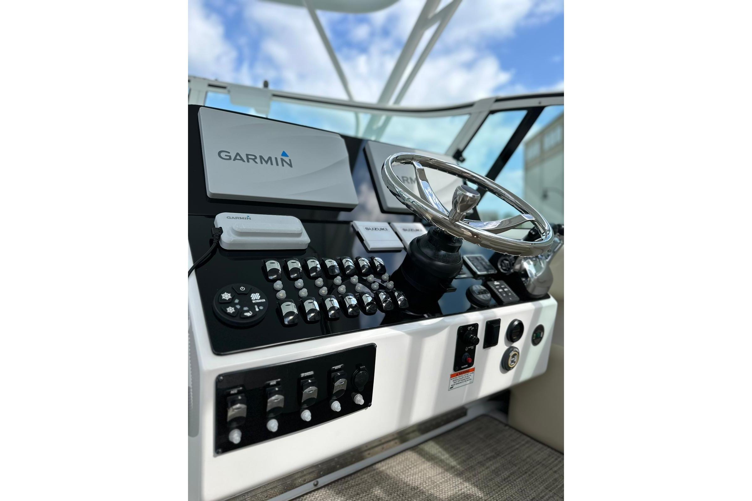 Helm of 2020 Stamas 326 Aegean boat with Garmin navigation system.