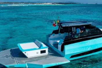  Yacht Photos Pics 2024 Suerte 50 yacht in turquoise waters with modern design and spacious deck.