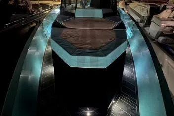  Yacht Photos Pics 2024 Suerte 50 boat with illuminated deck and sleek design.