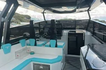 Yacht Photos Pics Interior of 2024 Suerte 50 boat with modern seating and sleek design.