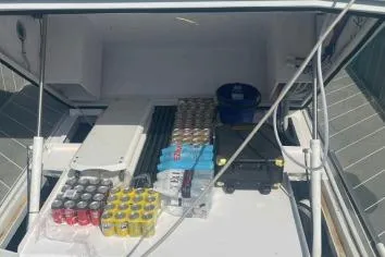  Yacht Photos Pics 2024 Suerte 50 boat deck with drinks and supplies.