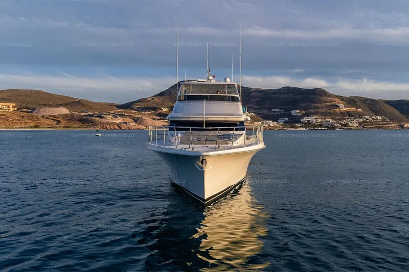 Mijito Yacht Photos Pics Luxury yacht Bravo 82, 2002 model, cruising in scenic coastal waters.