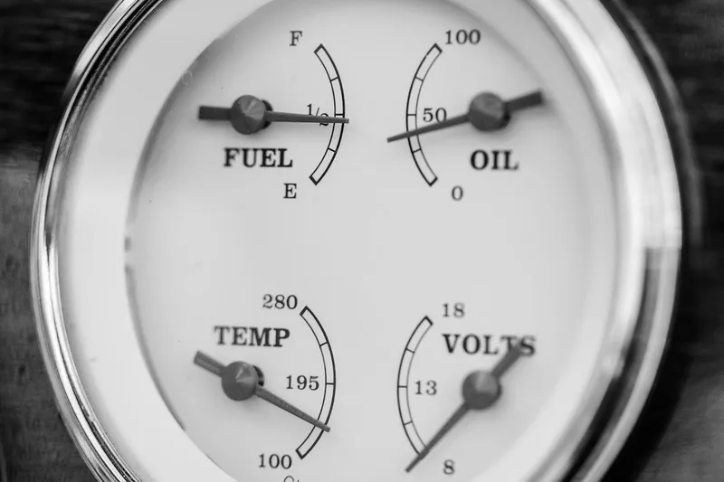 Liberty 1776 Yacht Photos Pics Close-up of a 2007 Hacker-Craft 32 Sportabout gauge panel showing fuel, oil, temperature, and voltage.