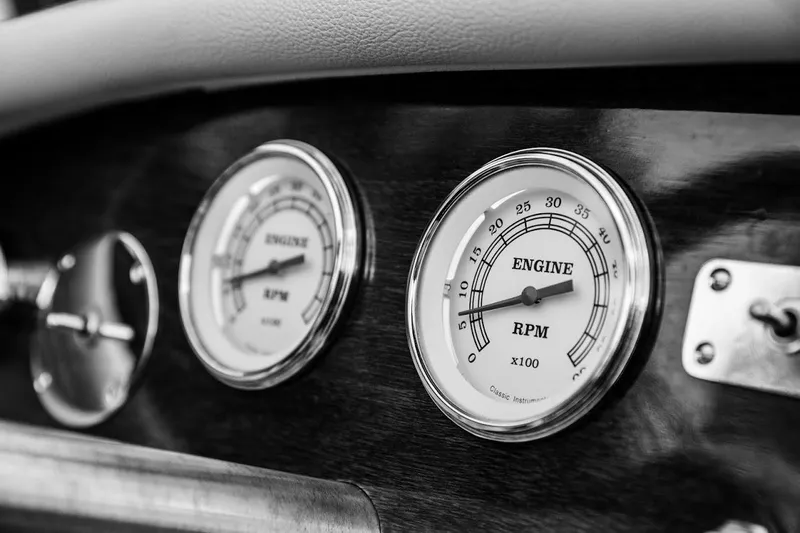 Liberty 1776 Yacht Photos Pics Close-up of 2007 Hacker-Craft 32 Sportabout dashboard with engine RPM gauges.