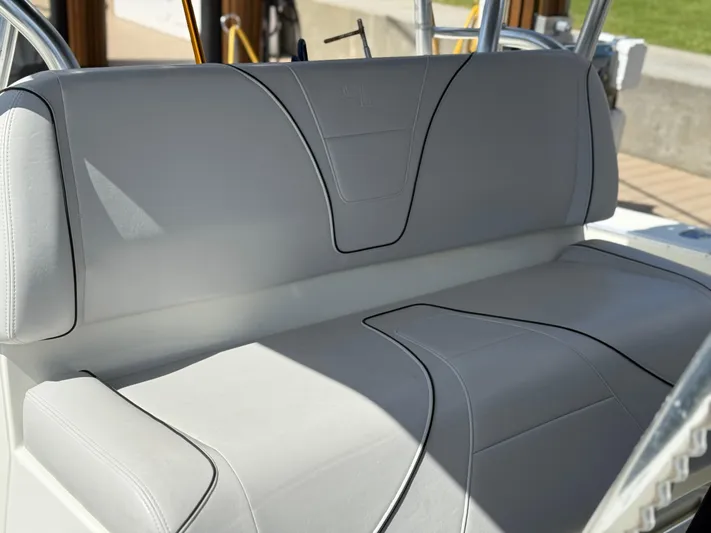  Yacht Photos Pics 2018 SeaVee 390Z boat seat with sleek gray upholstery and black trim.