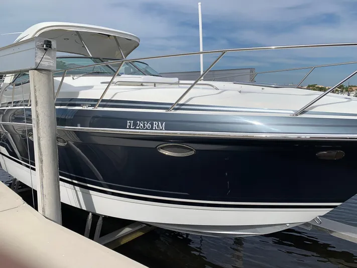 The Great Escape Yacht Photos Pics 2017 Formula 34 Cruiser docked at marina.