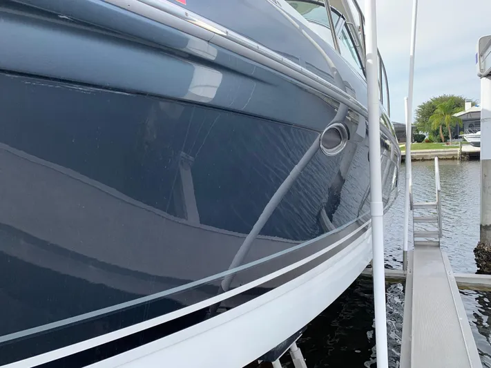 The Great Escape Yacht Photos Pics 2017 Formula 34 Cruiser docked at a marina.