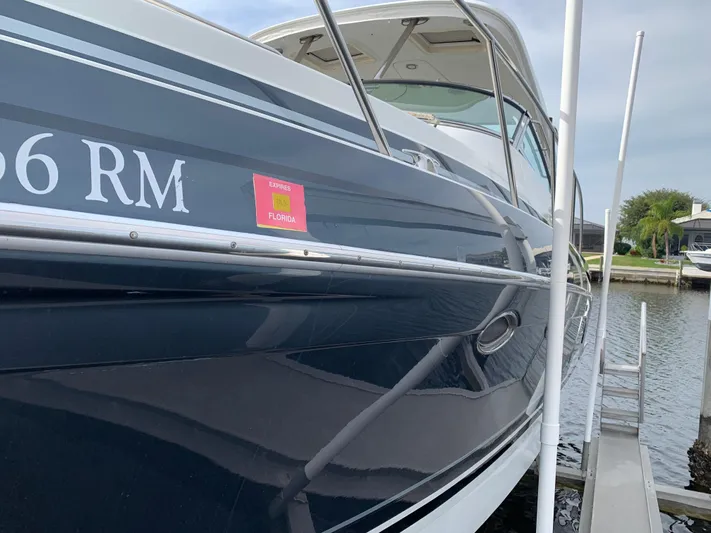 The Great Escape Yacht Photos Pics 2017 Formula 34 Cruiser docked at marina.