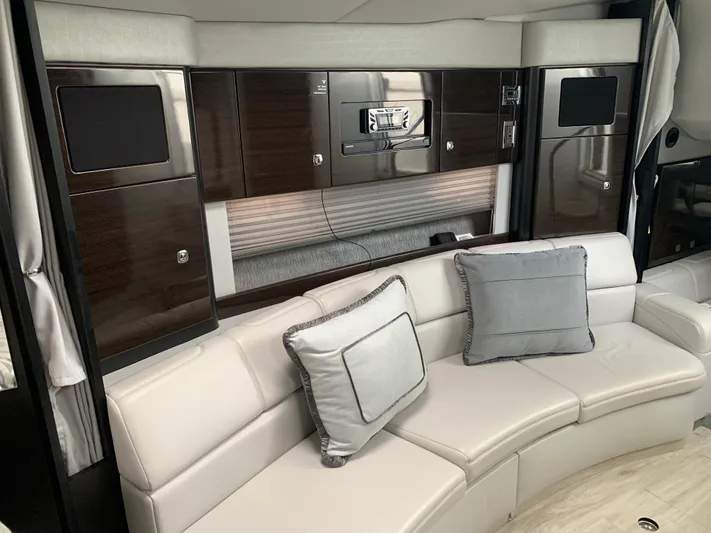 The Great Escape Yacht Photos Pics Luxurious interior of 2017 Formula 34 Cruiser with plush seating and modern cabinetry.