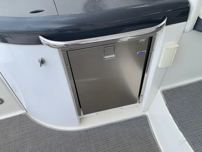 The Great Escape Yacht Photos Pics Stainless steel refrigerator on 2017 Formula 34 Cruiser boat.