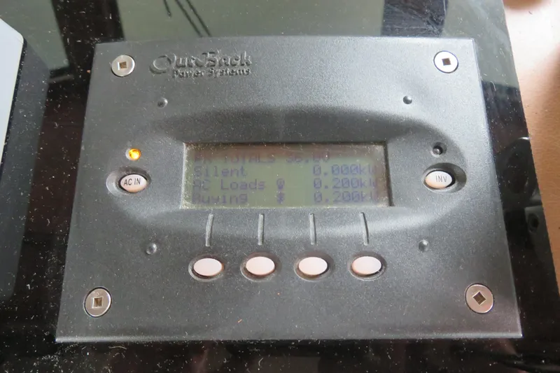 Rive' Gauche Yacht Photos Pics OutBack Power Systems control panel on 1986 Hatteras 58 Motor Yacht.