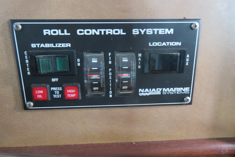 Rive' Gauche Yacht Photos Pics Control panel of 1986 Hatteras 58 Motor Yacht's Naiad Marine Systems roll control.