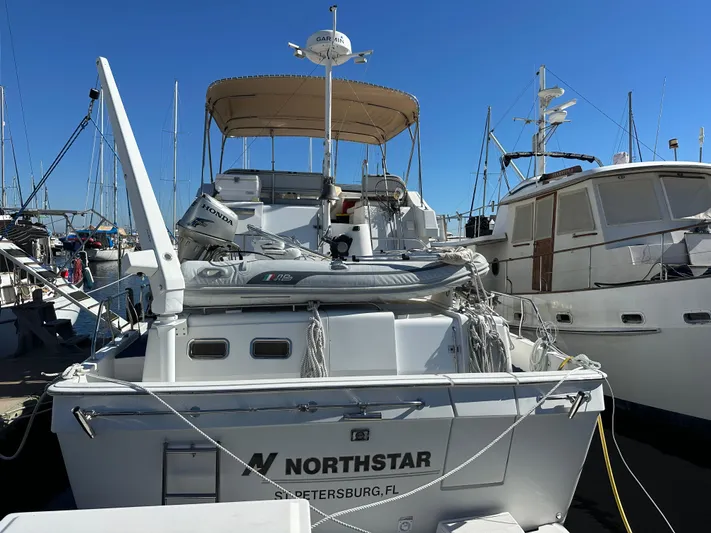 Northstar Yacht Photos Pics 2002 Mainship 430 Trawler docked, featuring "Northstar" name, St. Petersburg, FL.