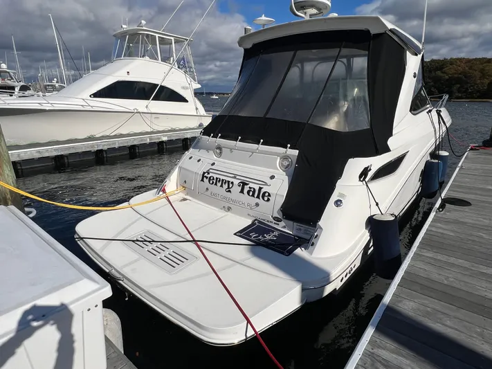  Yacht Photos Pics 2018 Sea Ray 350 Sundancer docked, rear view with "Ferry Tale" nameplate, East Greenwich, RI.