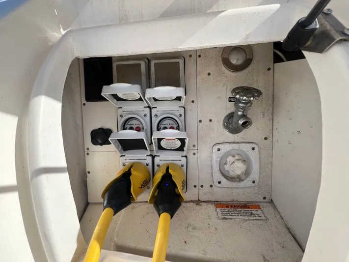  Yacht Photos Pics Electrical and water connections on a 2018 Sea Ray 350 Sundancer boat.