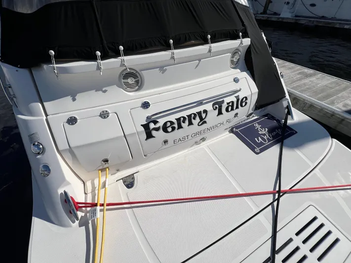  Yacht Photos Pics 2018 Sea Ray 350 Sundancer boat named "Ferry Tale" docked at a marina.