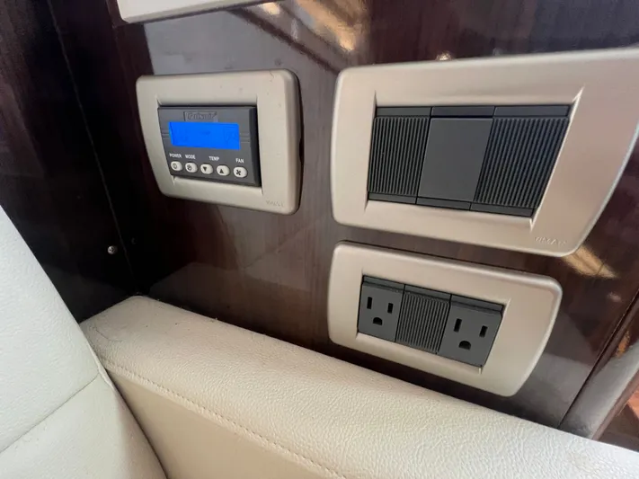  Yacht Photos Pics Control panel and outlets on 2018 Sea Ray 350 Sundancer yacht interior.