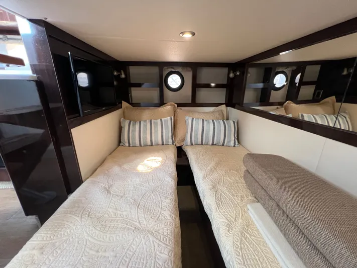  Yacht Photos Pics Interior cabin of 2018 Sea Ray 350 Sundancer with twin beds and elegant decor.