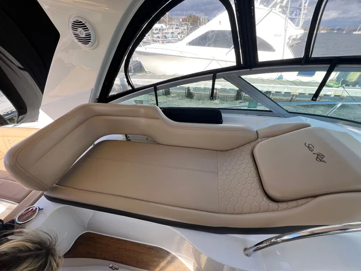  Yacht Photos Pics Luxurious seating on 2018 Sea Ray 350 Sundancer yacht, featuring elegant beige upholstery.
