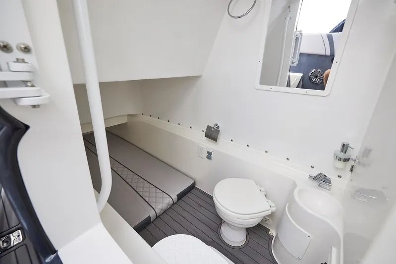  Yacht Photos Pics 2023 Midnight Express 37' Open boat interior with bed and toilet.