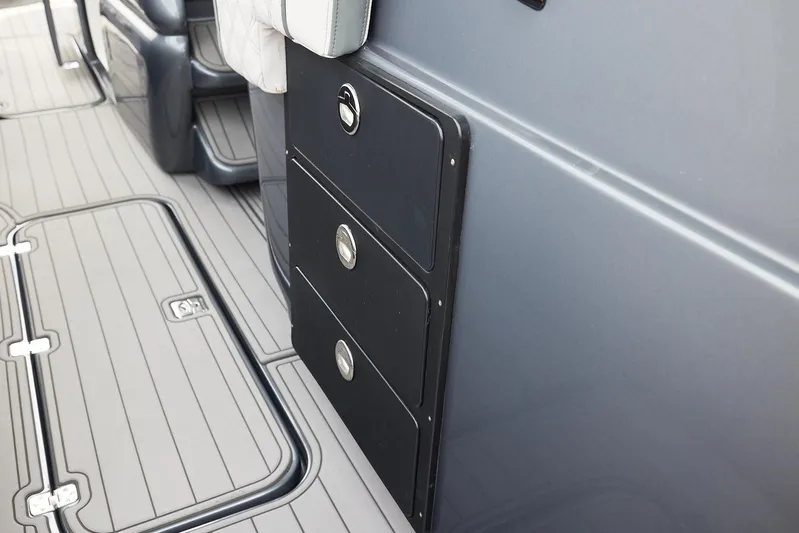  Yacht Photos Pics 2023 Midnight Express 37' Open boat interior with sleek storage compartments and modern design.