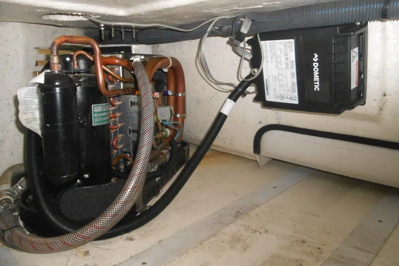  Yacht Photos Pics Engine room of 2007 Sea Ray 44 Sundancer with Dometic equipment and copper piping.