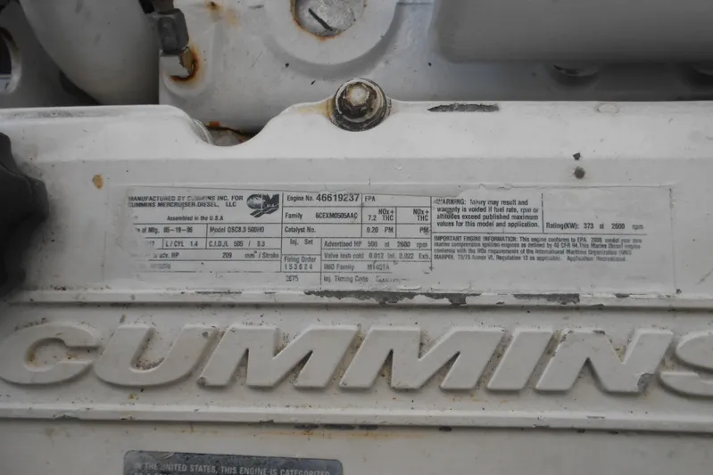  Yacht Photos Pics Cummins engine label on a 2007 Sea Ray 44 Sundancer, detailing specifications and warnings.