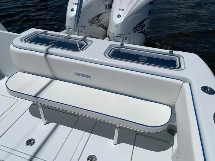  Yacht Photos Pics 2021 Contender 35 ST boat with Yamaha engines and cushioned seating.
