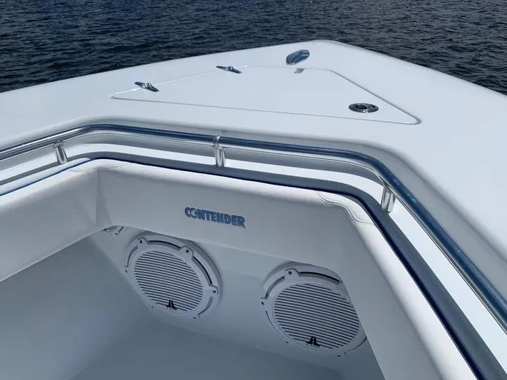  Yacht Photos Pics Contender 35 ST 2021 boat interior with speakers, railing, and water view.