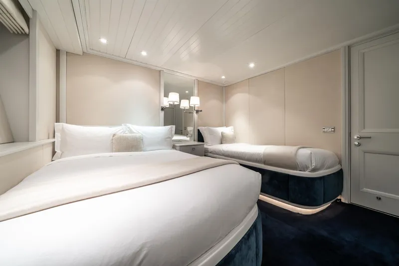 Moatize Yacht Photos Pics Luxurious twin bedroom on 1998 Pendennis Custom yacht with modern decor.