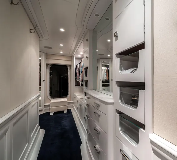 Moatize Yacht Photos Pics Luxurious yacht interior with sleek white cabinetry and elegant lighting, Pendennis Custom 1998 model.