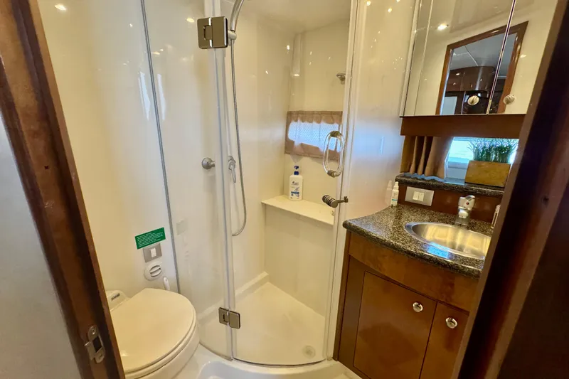 Water Baby Yacht Photos Pics Luxurious bathroom in 2007 Carver 43 Motor Yacht with shower and vanity.