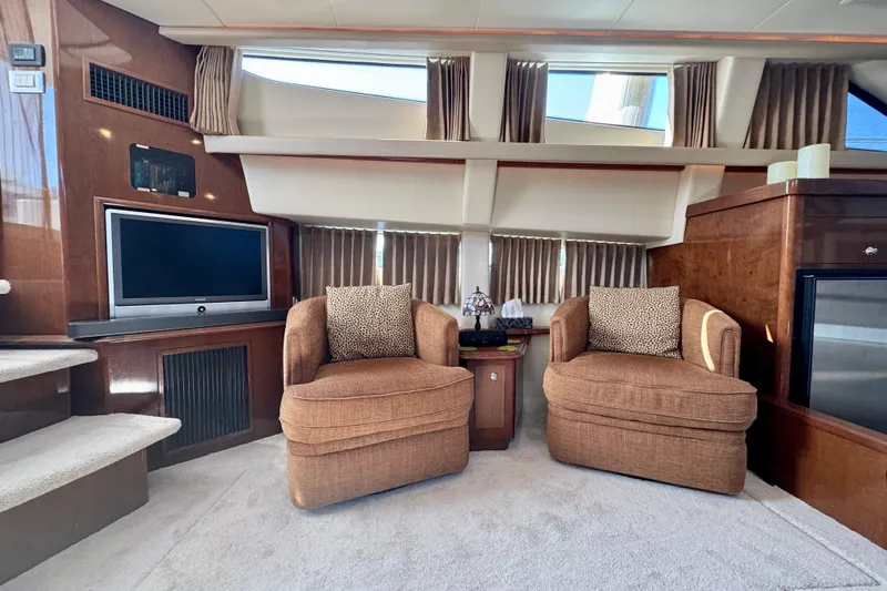 Water Baby Yacht Photos Pics Luxurious interior of 2007 Carver 43 Motor Yacht with plush seating and entertainment area.