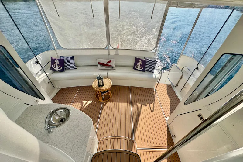 Water Baby Yacht Photos Pics Luxurious 2007 Carver 43 Motor Yacht interior with elegant seating and nautical decor.