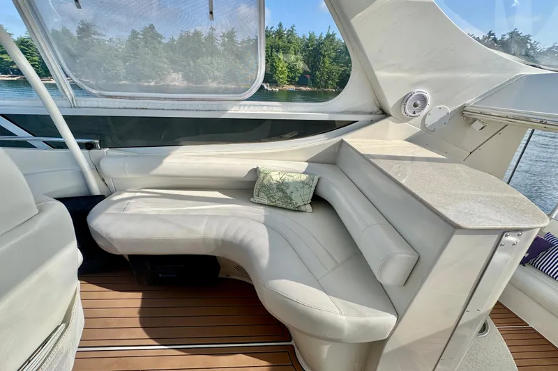 Water Baby Yacht Photos Pics Luxurious seating area on a 2007 Carver 43 Motor Yacht with scenic water view.