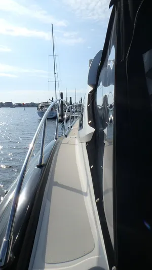 My Way Yacht Photos Pics Side view of 2006 Azimut Atlantis 55 yacht on water.