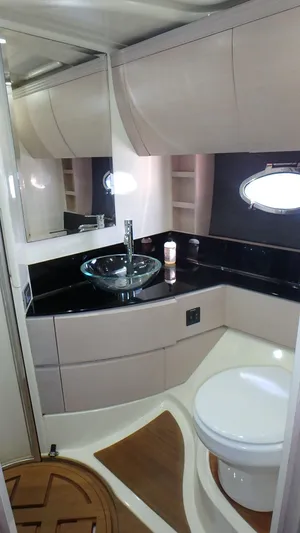 My Way Yacht Photos Pics Luxurious bathroom in 2006 Azimut Atlantis 55 yacht with modern fixtures and elegant design.