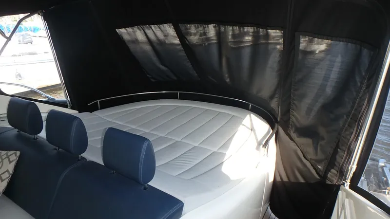 My Way Yacht Photos Pics Interior view of 2006 Azimut Atlantis 55 yacht with cushioned seating.