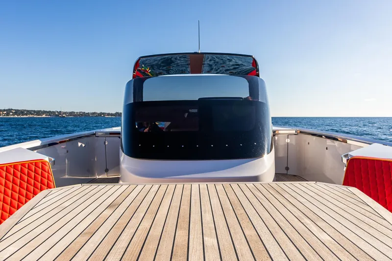  Yacht Photos Pics 2024 Frauscher 1414 Demon luxury yacht on open sea, featuring sleek design and spacious deck.