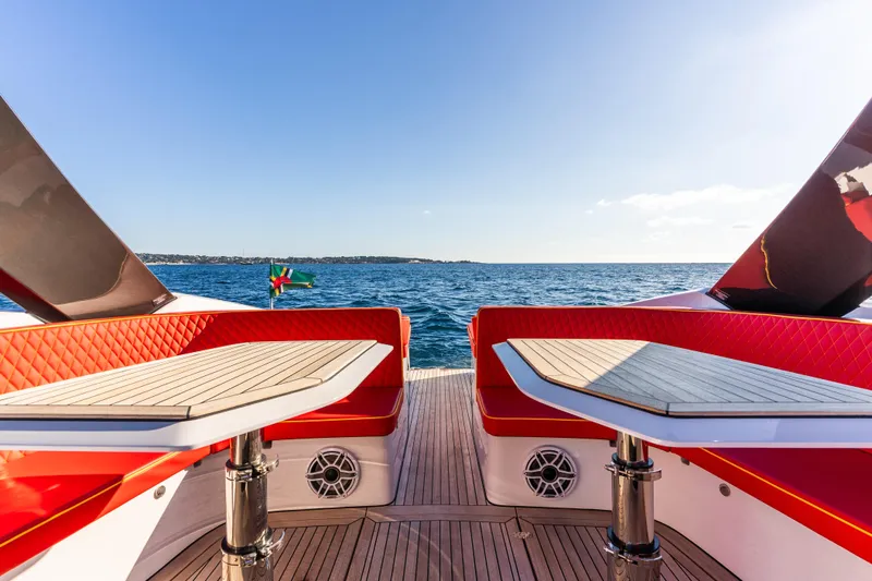  Yacht Photos Pics Luxury 2024 Frauscher 1414 Demon yacht interior with red seating and ocean view.