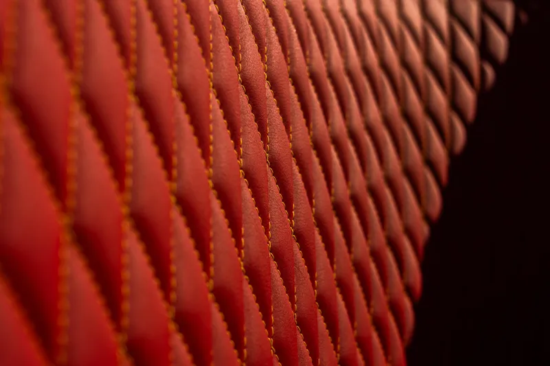  Yacht Photos Pics Red quilted leather interior of 2024 Frauscher 1414 Demon boat.