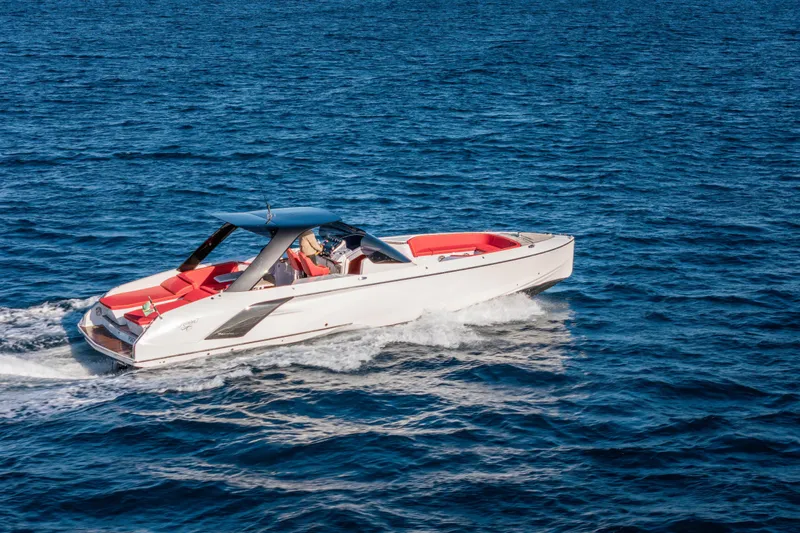  Yacht Photos Pics 2024 Frauscher 1414 Demon luxury yacht cruising on open blue water.