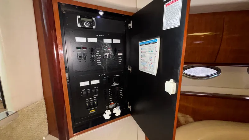  Yacht Photos Pics Electrical panel inside a 2004 Sea Ray 420 Sundancer yacht cabin.