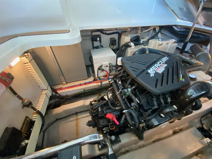  Yacht Photos Pics Engine room of 2004 Sea Ray 420 Sundancer with Mercury engine components.