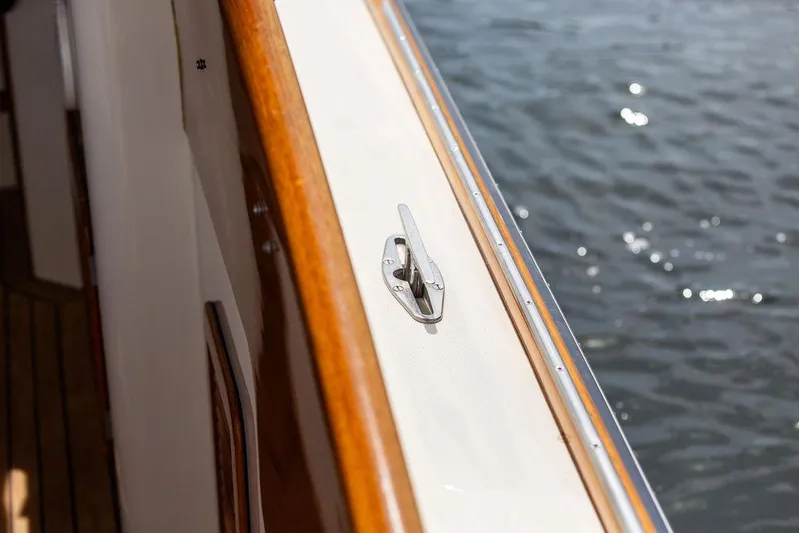 Admiralty Yacht Photos Pics 2005 Hinckley Picnic Boat EP deck detail with polished wood and water view.