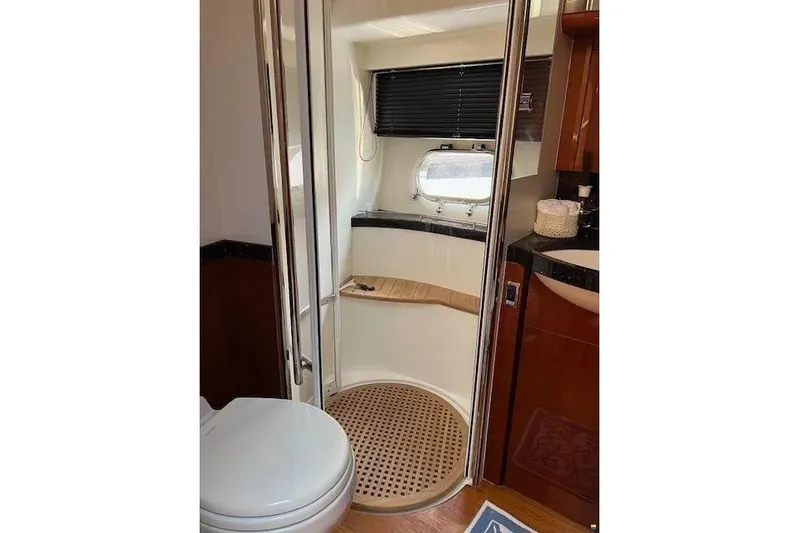  Yacht Photos Pics Luxurious bathroom in 2006 Princess 67 Flybridge Motor Yacht with modern fixtures.