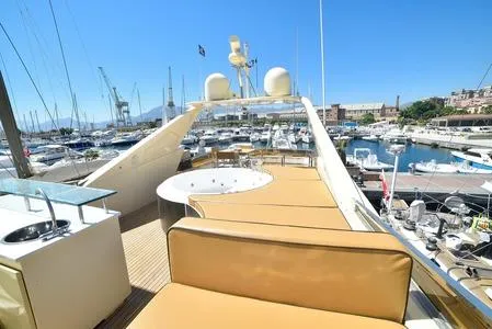  Yacht Photos Pics Luxurious Tecnomar NADARA 80 flybridge yacht, 2008, with spacious deck and marina view.