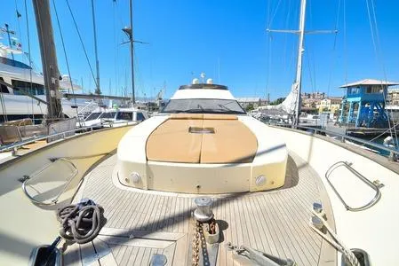  Yacht Photos Pics Luxurious 2008 Tecnomar NADARA 80 flybridge yacht docked in a sunny marina.
